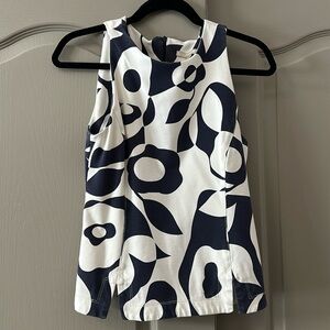 Banana Republic 
Woman’s Sleeveless top
Size 6
Zipper in back
Blue & white